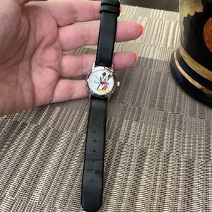 Disney Mickey Mouse watch with leather straps.